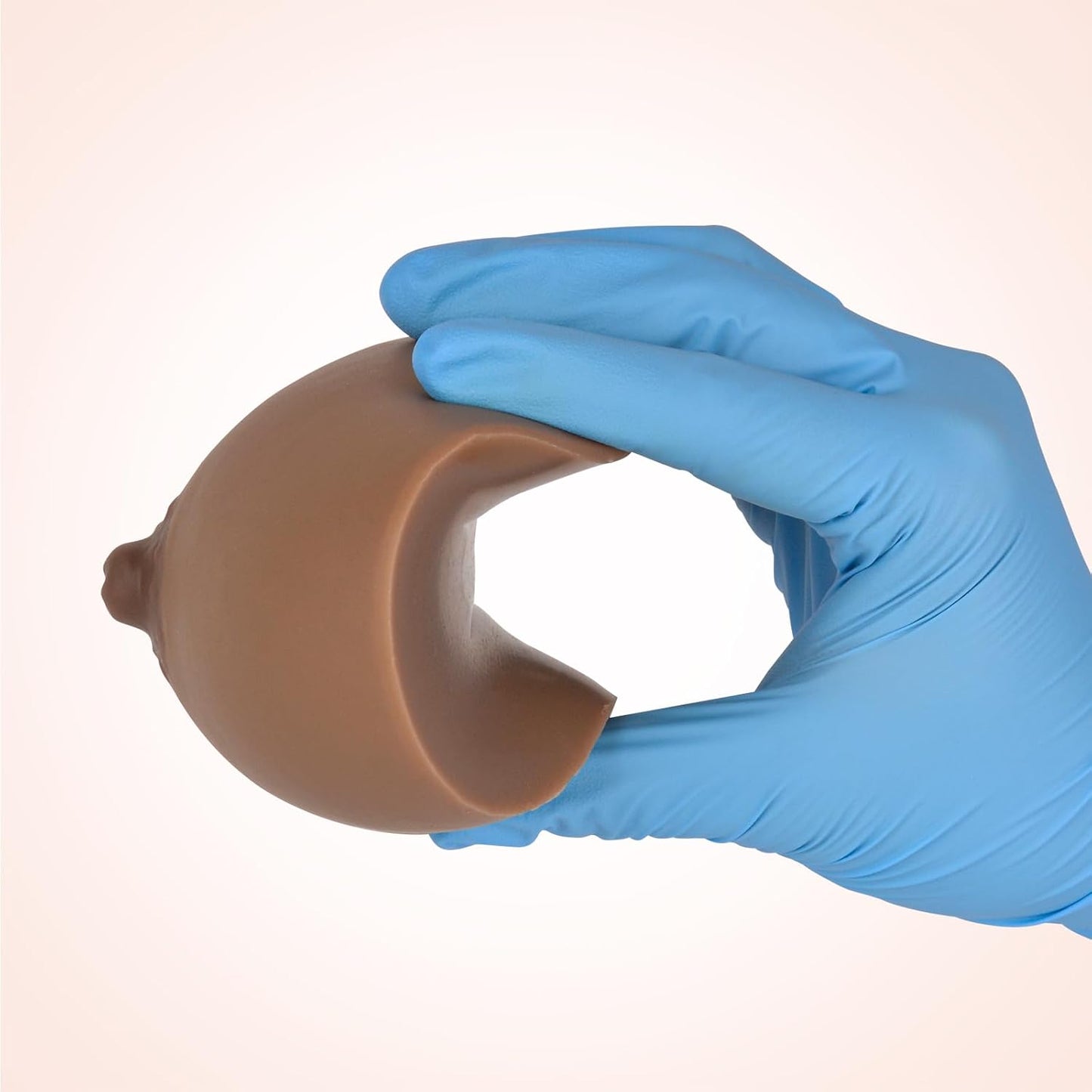 Dark Areola Breast Model Used For Nursing Practice Session