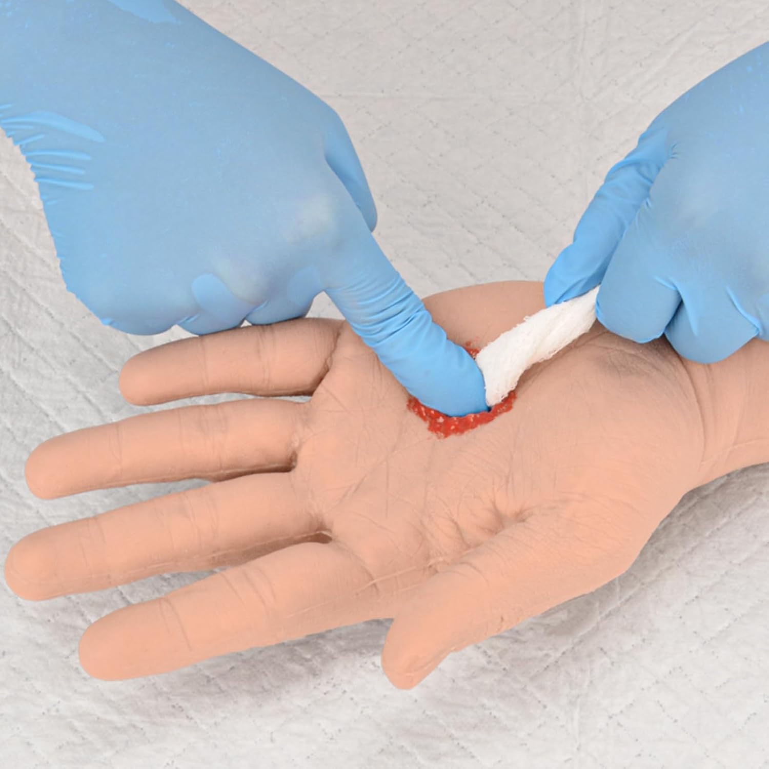 Demonstrate Wound Packing And Pressure Hemostasis on Hand Model