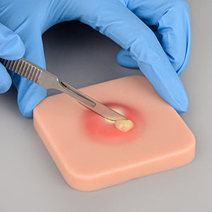 Medical Student Practicing Abscess Drainage
