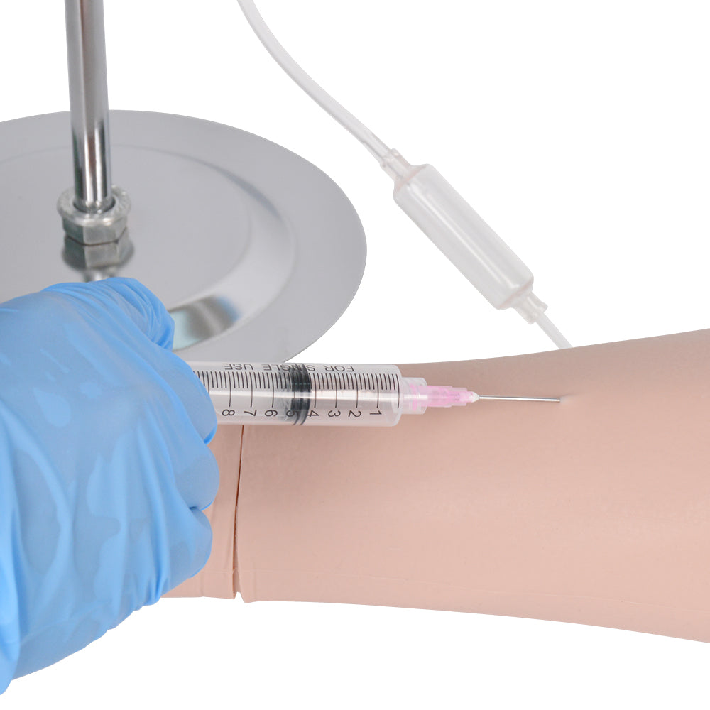 Medical Student Using IV Injection Training Arm