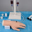 Close-Up of IV Needle Inserted into Lifelike Hand Vein